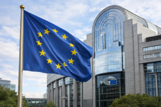 European Union flag outside a government building ahead of the EU AI Act transparency deadline