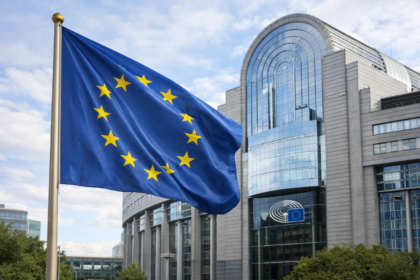 European Union flag outside a government building ahead of the EU AI Act transparency deadline