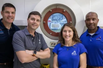 Artemis II astronauts returning to Earth after historic NASA moon mission splashdown 2026