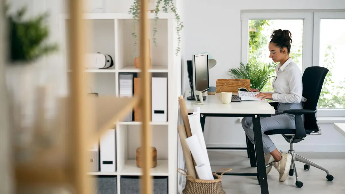 Young professional at empty desk — Gen Z careers AI displacement 2026