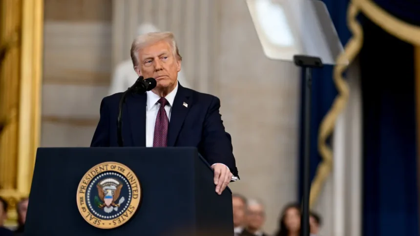 Donald Trump speaking at a White House podium during official address on Truth Social and national security